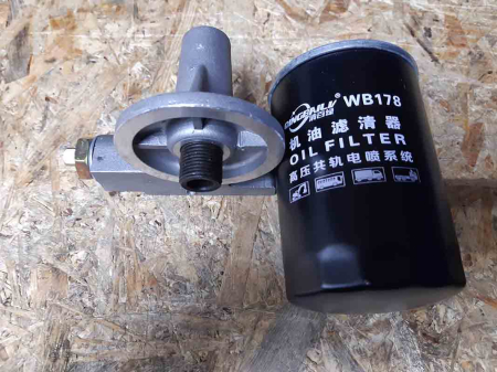 Кронштейн масляного фильтра М=18мм WB178 KM385BT(JM240/244/FT244/240)