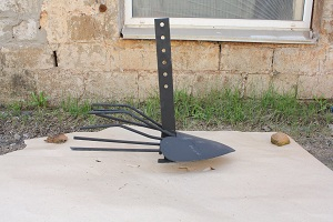 Universal potato digger for walk-behind tractor
